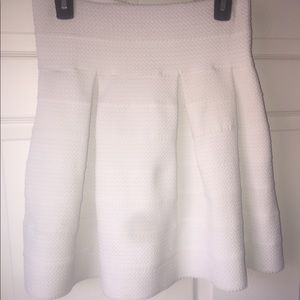 White pleated circle skirt